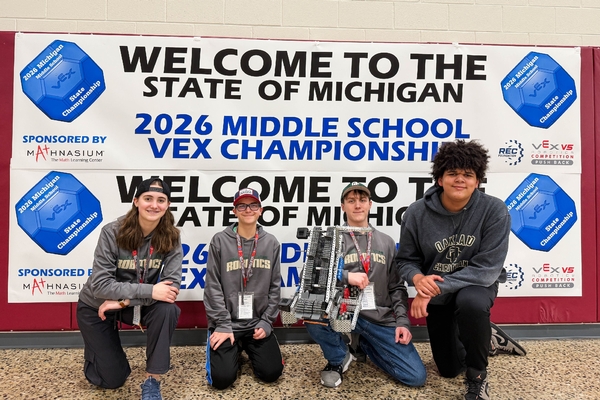 Oakland Christian students with their VEX robots at the State of Michigan Middle School Championship