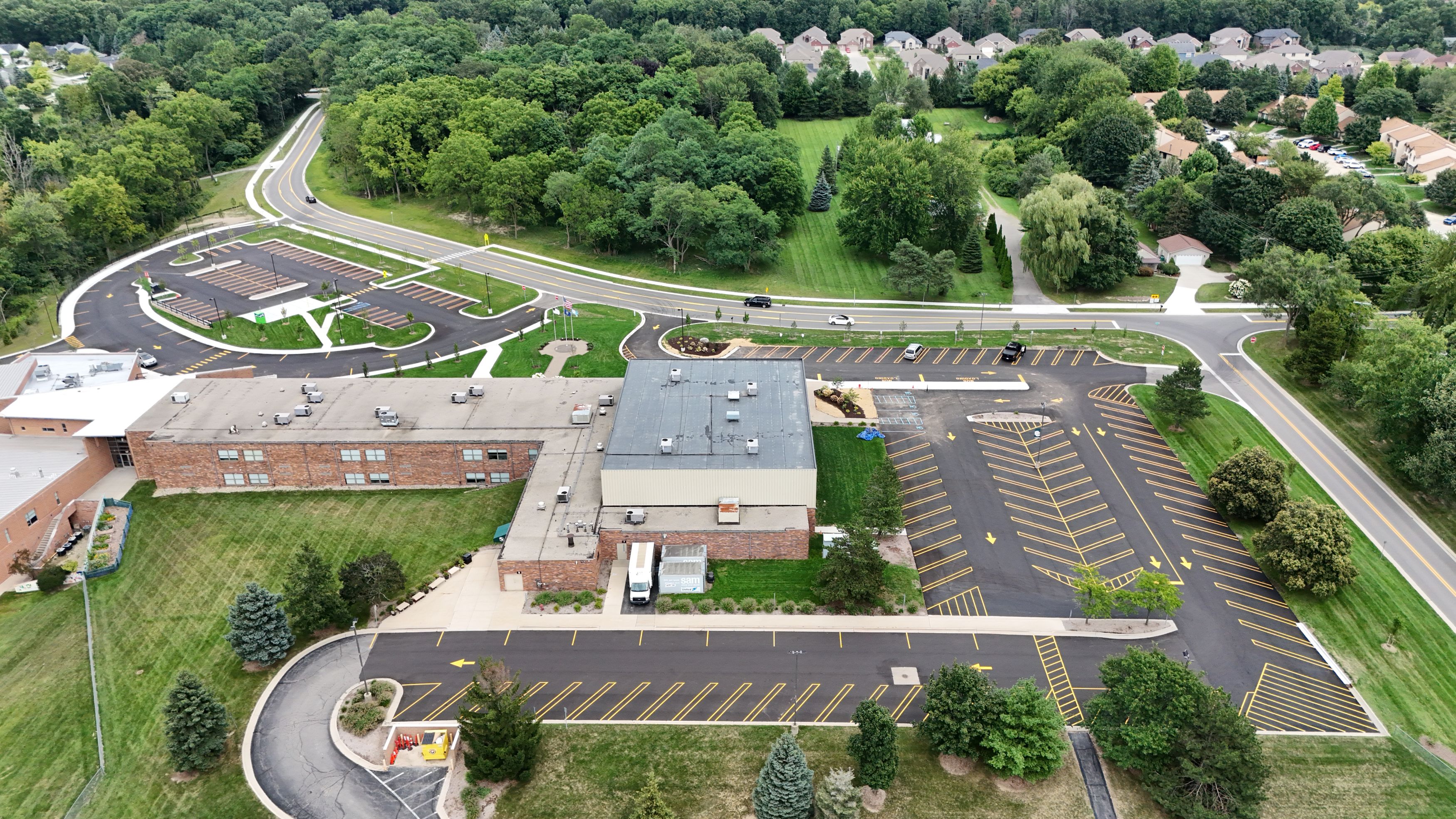 Aerial view of the Oakland Christian School campus showing the new parking lot and reconfigured road.